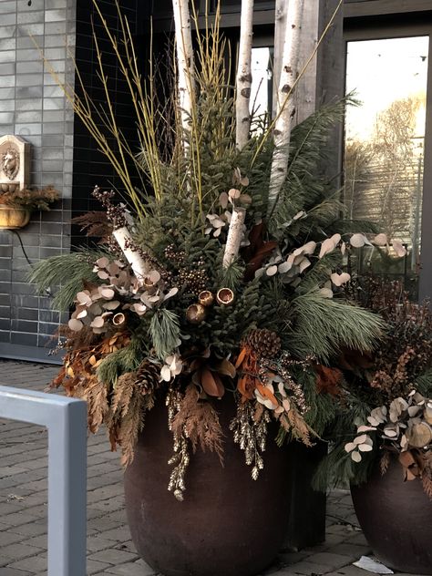 How To Make A Porch Pot For Christmas, Modern Winter Planters Outdoor, Winter Greenery Outdoor Pots, Holiday Pots Outdoor, Winter Outdoor Pots Ideas, Spruce Tips Planters, Winter Arrangements Outdoor, Christmas Porch Pot Ideas, Holiday Outdoor Planters