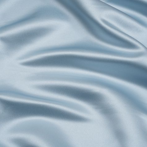 This icy Baby Blue Premium Polyester Satin has a chilly opulence. Featuring a medium weight, sleek hand, and fluid drape, it’s the perfect choice for eye-catching evening wear.Suggested Projects:  Dresses, Skirts, Blouses, ShirtsContent:  100% PolyesterStretch:  NoneOpacity:  OpaqueCome in from the cold and luxuriate in this baby blue satin. A sleek hand, lustrous face, and fluid drape combine to deliver affordable elegance to your wardrobe. This medium-weight, pale blue fabric enjoys a simple s Satin Aesthetic, Mood Designer Fabrics, Blue Satin Dress, Baby Blue Aesthetic, Free Sewing Pattern, Baby Blue Colour, Mood Fabrics, Icy Blue, Color Analysis