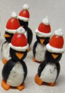 Penguins made from black olives, cream cheese, carrots, and cherry tomatoes. Black Olive Penguins, Olive Penguins, Cheese Carrots, Olive Appetizer, Christmas Penguins, Lake Party, Penguin Party, Charcuterie And Cheese Board, Black Olives