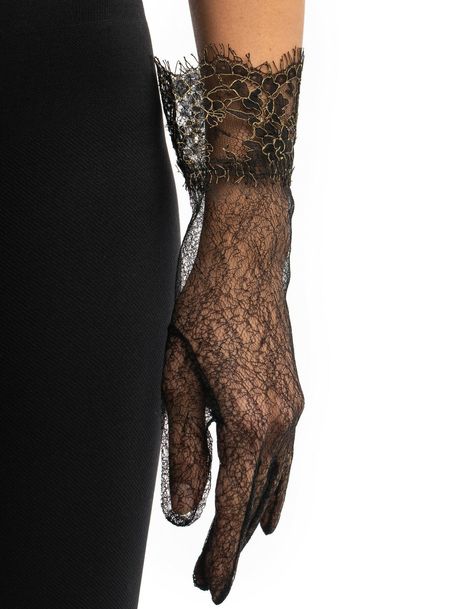 Aishan Gloves II feature black limited web lace and black & gold Valencienne lace on the wrists. The gloves guarantee a sophisticated aesthetic when matched with dark blouse or golden necklace.DETAILS Black lace 100% polyamide Valencienne Nylon Lace with Lurex gold One size Spot clean with a damp cloth Carefully handmade in Baku, finished in London