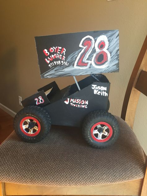 Valentine's Day box made to look like daddy's sprint car.  Race car Valentines box. #sprintcar #racecar #valentinesbox  Made with cardboard box, paint, kabob sticks, glue, tires and wheels from RC car. Race Car Valentines Boxes, Motocross Valentine Boxes, Racecar Valentines Boxes, Race Track Valentine Box Ideas, Race Car Box Diy, Dirtbike Valentines Boxes, Cardboard Box Racing Car, Valentines Day Box Ideas, Unique Valentine Box Ideas