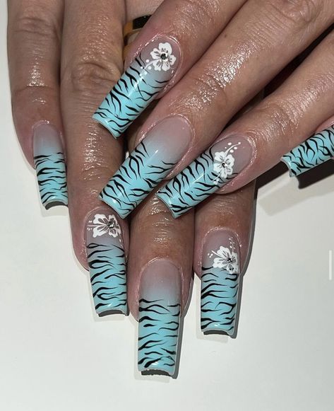 nails by: @nailedbyyans (on IG) Blue Tiger Print Nails, Tiger Design Nails, Blue Tiger Nails, Light Blue Y2k Nails, Zebra Print Nails Y2k, Teal Leopard Nails, Blue Zebra Nails, Tiger Stripe Nails, Pink Zebra Nails