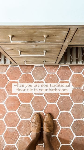 Becky George | House + Home on Instagram: "WHY I CHOSE TERRACOTTA for my bathroom flooring:

✨we used pure 6x6 terracotta hex tiles and put a clear sealant on top for protection—this selection was a huge risk—most people use it for outdoor spaces, but in my mind, why not for a bathroom?! I’m so glad I chose it because it’s unique for this space and people always ask us about it!

✨I knew I wanted something different, long lasting and timeless. terracotta tiles are unique, beautiful (with natural color striations), durable, and super easy to maintain (with a proper seal to protect from any staining). 

we are over a year since install, and NO REGRETS!! would you try this?! happy to answer any questions you might have!

#bathroomdesign #bathroomtile #terracotta #homedecor #homeinspo #lovewhe Terracotta Floor Tiles Bathroom, Bathroom With Terracotta Floor Tiles, Bathroom Floor Tiles Design Ideas, Terracotta Bathroom Ideas, Terracotta Bathroom Tiles, Terracotta Tile Bathroom, Terracotta Tiles Bathroom, Terracotta Bathroom, Terracotta Tile Floor