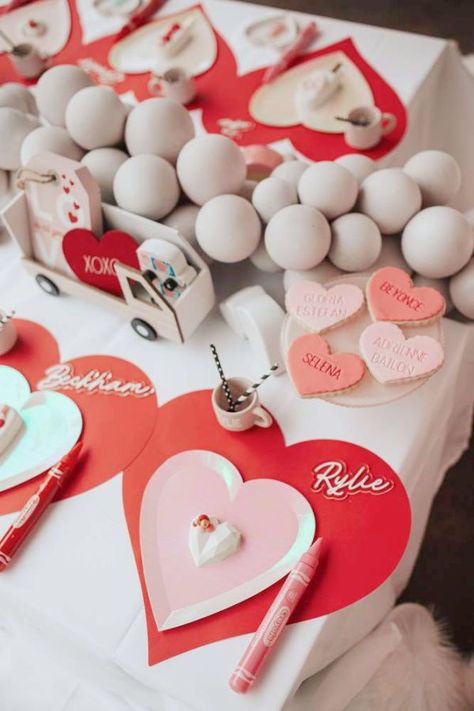 Take a look at this lovely XOXO Valentine's Day party! The table settings are fantastic! See more party ideas and share yours at CatchMyParty.com Xo Themed Party, Xoxo Party Theme, Balloon Garland Centerpiece, Valentine's Day Heart Bracelet For Party, Heart-shaped Beaded Bracelets For Valentine's Day Party, Heart-shaped Charm Bracelet For Valentine's Day Party, Valentines Party Decor, Heart Cakes, Valentine's Day Party