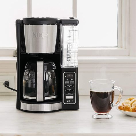 Ninja 12-Cup Programmable Coffee Maker with Classic and Rich Brews, 60 oz. Water Reservoir, and Thermal Flavor Extraction (CE201), Black/Stainless  #ninjacoffeemaker Steel #coffeemaker #coffeebrewer #coffeemakeroncounterideas #coffeemakerdesign #coffeebrewing #coffeebrewingsmoothie #giftideasforcofffeelover #birthdaygiftideas #kitchenessentials #kitchentools #weddingresgistry Ninja Coffee Maker, Best Drip Coffee Maker, Ninja Coffee, Drip Coffee Makers, Best Coffee Maker, Automatic Coffee Machine, Coffee Brewer, Glass Carafe, Coffee Filters