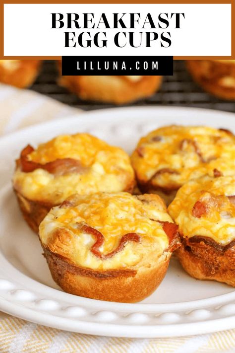 Deliciously cheesy Breakfast Egg Cups have a crispy crescent roll bottom layered with eggs, bacon and cheese on top! #eggcups #breakfast #breakfasteggs #baconeggcups #eggs Eggcups Breakfast, Breakfast Egg Cups, Bacon Egg Cups, Baked Egg Cups, Egg Muffins Healthy, Cheesy Breakfast, Egg Cups Recipe, Egg Cups Breakfast, No Bake Energy Bites