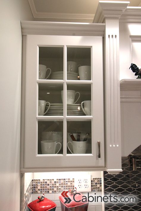 White cabinets look clean and classic, but there are other ways to add this popular color to your kitchen. #whitekitchen White Cabinets Glass Doors, Clear Cabinets Kitchen Glass Doors, How To Install Glass In Cabinet Doors, Glass Aluminum Kitchen Cabinet, Beveled Glass Kitchen Cabinet Doors, Clear Kitchen Cabinets, Kitchen Glass Cabinets, Dinnerware Display, Discount Cabinets