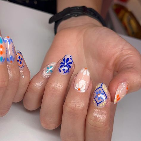 Channeling the vibrant spirit of Mexican pottery with these intricate nail designs. Each pattern tells a story, bringing a touch of culture and artistry to your fingertips. 🌸✨ #MexicanPottery #NailArt #HandPaintedNails #CulturalBeauty #NailInspo #ArtisticNails #BrightAndBold #NailDesign #NailTech #ColorfulNails @lianakorber Mexican Nail Art Mexico, Barro Nails Mexican, Mexican Tile Nails, Mexico Inspired Nails, Mexican Nails Designs, Mexican Style Nails, Intricate Nail Designs, Mexican Nails, Aqua Nails