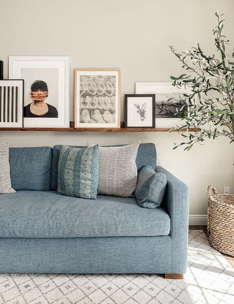 learn how to create a gallery wall in your home // gallery wall tips // light blue sofa // gray and white rug // floating shelf gallery wall Light Blue Sofa Living Room, Light Blue Couches, Art Ledge, Gallery Wall Tips, Blue Sofa Living, Light Blue Sofa, Blue Sofas Living Room, Industrial Country, Latest Sofa Designs