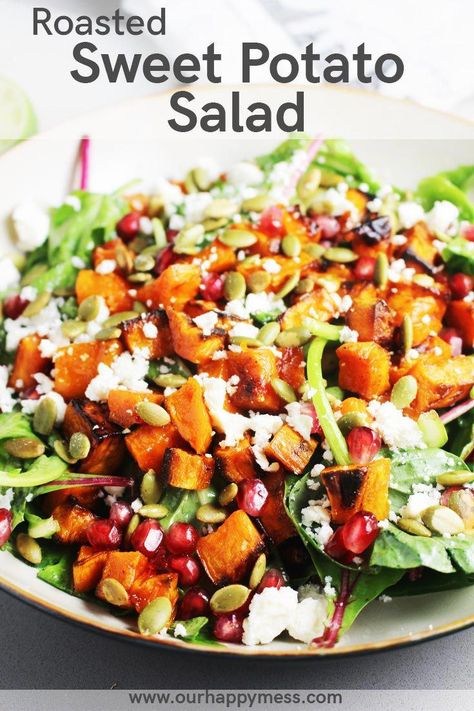 This roasted sweet potato salad recipe with baby kale or spinach, feta, pomegranate seeds, pepitas and a lime dressing makes a gorgeous main course fall salad, or Thanksgiving side dish. It's simple to prepare on a weeknight, vegetarian, and filled with healthy ingredients to make you feel great! #salad #healthyrecipes #dinner #sweetpotatoes #Thanksgiving #Thanksgivingrecipes via @ourhappymess #WildGreenSalads Roasted Sweet Potato Salad, Sweet Potato Salad Recipe, Sweet Potato Salad, Fall Salad, Thanksgiving Side Dish, Spinach Feta, Roasted Sweet Potato, Baby Kale, Potato Salad Recipe