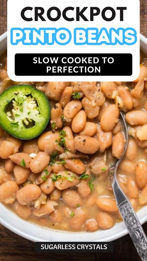 Easy crockpot pinto beans are the perfect side dish or topper for many latin cuisine dishes. These pinto beans are slow cooked to perfection with little effort. The best homemade slow cooker pinto beans recipe for the best vegetarian side dish Crockpot Pinto Beans, Slow Cooker Pinto Beans, Pinto Beans Recipe, Vegetable Entrees, Beans In Crockpot, Pinto Bean Recipes, Yummy Vegetable Recipes, Dinner Recipes Healthy Family, Vegetarian Side Dishes