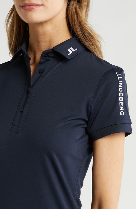 Stretchy, sweat-wicking fabric swings you from links to lunch in a golf polo sporting embroidered logo details and a soft feel for all-activity comfort. Button half-placket Spread collar Short sleeves Moisture-wicking fabric engineered for dryness and comfort 100% polyester Machine wash, tumble dry Imported Tshirt Corporate Design, Corporate Polo Shirt Design, Corporate Tshirt Design, Corporate Shirt Design, Polo Shirt Uniform, Polo Uniform, Corporate T-shirt, Best Uniforms, Tshirt Polo