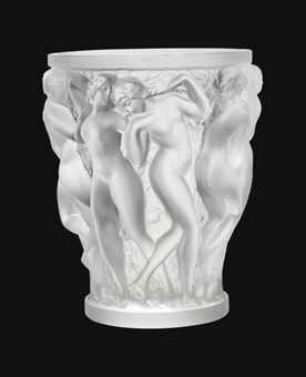 RENÉ LALIQUE (1860-1945) BACCHANTES VASE, NO. 997, DESIGNED 1927 executed post-1945, clear and frosted glass 9 5/8 in. (24.5 cm.) high engraved Lalique France Price Realized $5,067 christies.com Estimate ($1,569-$2,354) Lalique Vase, Lalique Perfume Bottle, Vase Cristal, Clear Vase, Lalique Crystal, Hood Ornaments, Apple Blossom, Crystal Collection, Glass Artists