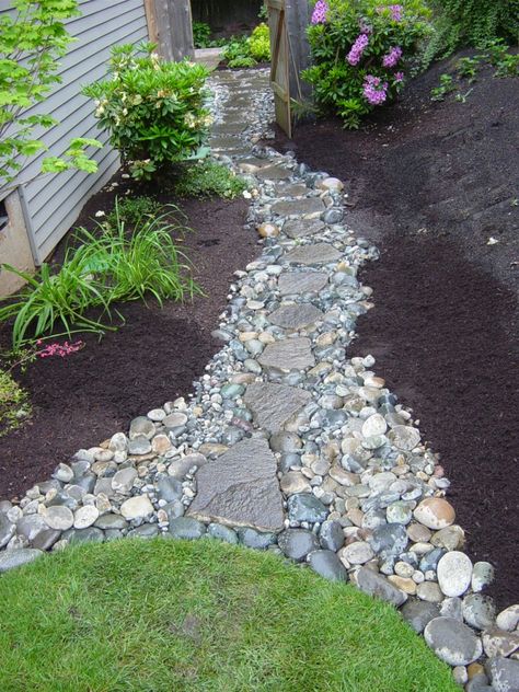 River Rock Walkway. This might work on the side of my house, where it drains to my backyard. Rock Walkway, Hillside Terrace, Privacy Fence Landscaping, Yard Path, Stone Paths, Landscape Drainage, Backyard Drainage, Walkway Landscaping, Side Yard Landscaping