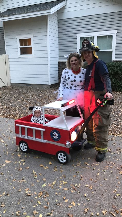 Fire Truck Costume, Stroller Halloween Costumes, Dalmatian Firefighter, Wagon Halloween Costumes, Wagon Costume, Truck Costume, Firefighter Halloween, Family Themed Halloween Costumes, Diy Baby Costumes