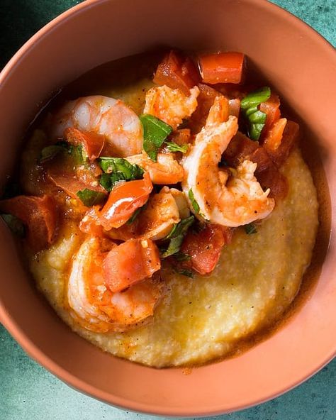 Think shrimp and grits goes to Venice. Michela Tasca, owner of Ca’ de Memi farm and bed and breakfast in Piombino Dese, just north of Venice, taught us a version in which the shrimp, traditionally tiny little ones from the lagoons surrounding Venice (schie) are poached in a simple tomato sauce accented with garlic and fresh herbs. Instead of the tedious stirring typically required to make creamy polenta, ours bubbles away in the oven while you prepare the sauce.⁠⁠Get our recipe for Polenta with Simple Tomato Sauce, How To Cook Polenta, Easy Tomato Sauce, Milk Street, Creamy Polenta, Shrimp And Grits, Shrimp N Grits, Large Shrimp, Food Writing