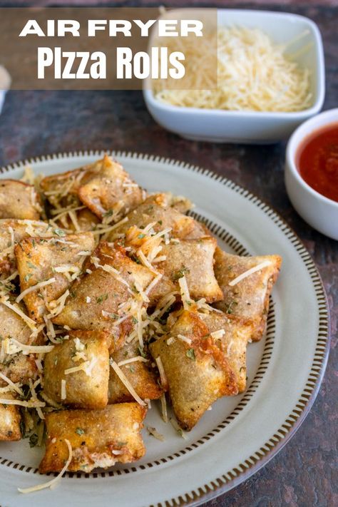 garlic parmesan pizza rolls made in an air fryer on a plate with parmesan in the background. Crockpot Chicken Potatoes, Chicken Potatoes And Green Beans, Slow Cooker Chicken Potatoes, Air Fryer Pizza Rolls, Crockpot Chicken And Potatoes, Slow Cooker Meal Prep, Air Fryer Pizza, Crispy Rolls, Pizza Roll Recipe