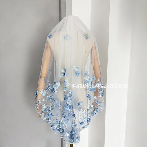 Soft Tulle Blue Flower Lace Wedding Veil Fabric: Soft Tulle Length shown in pictures: 36'' fingertip length Any length is available, if you need custom length, please contact me. Width:  If veil length is 118'' or longer than 118'', width is 118''.  If veil length is under 118'', you can contact me to check the exact length If you need other width, you can contact me, we can make custom width. Color Shown in pictures: Light Ivory Colors Option: Ivory/ White/ Beige/ Champagne/ Custom Color There Blue Flower Wedding Veil, Colorful Wedding Veils, Blue Flower Veil, Blue Veil Wedding, Blue Wedding Veil, Embroidered Veil, Color Veil, Sky Blue Weddings, Ivory Bridal Veil