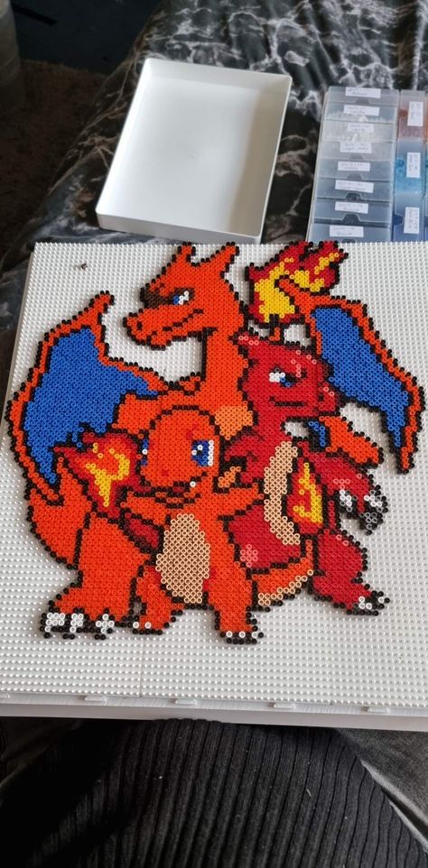 Creating with Hama beads 😁 Charmander Perler Bead Pattern, Peeler Bead Pokémon, Pokemon Hama Beads Pattern, Pokemon Pearl Beads, Pokemon Pixel Art Pattern, Perler Bead Patterns Pokemon, Pokémon Perler Beads, Perler Beads Pokemon, Charmander Evolution