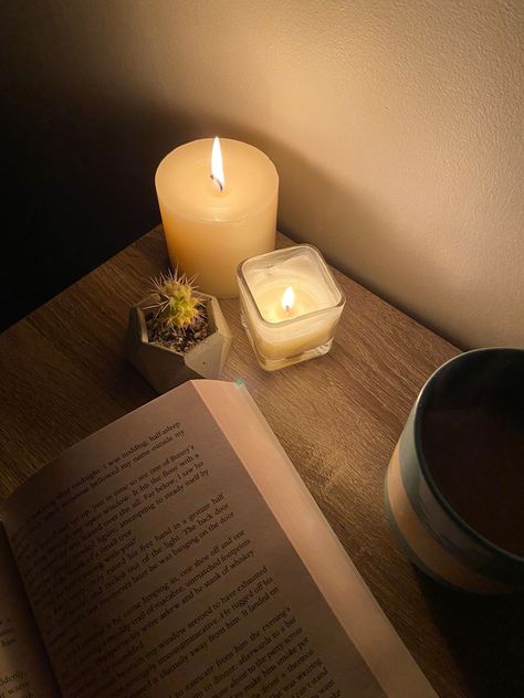 reading by candlelight with coffee Candle Light Reading, Book And Candle Aesthetic, Books And Candles Aesthetic, Candlelight Aesthetic, Reading By Candlelight Aesthetic, Reading By Candlelight, Ig Pictures, Night Time Candle Aesthetic, Bookish Aesthetic