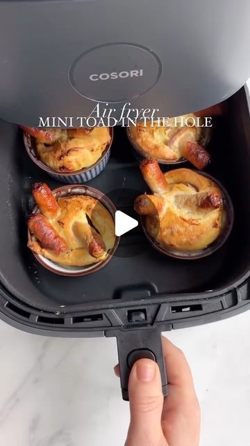 Hayley Dean on Instagram: "Mini toad in the hole 😍😋 SO good! There is a toad in the hole recipe in my air fryer cookbook available on Amazon, Waterstones, Sainsbury’s, Asda, etc!  I started by adding red onion, mini sausages, and a splash of oil in each ramekin, air fry on 200 for 4 mins, then add Yorkshire pudding batter, air fry on 200 for 12 mins (don’t open the air fryer!) DELISH!" Toad In The Hole Recipe, Mini Sausages, Yorkshire Pudding Batter, Toad In The Hole, Yorkshire Pudding, Air Fry, Sausages, Air Fryer Recipes, Toad