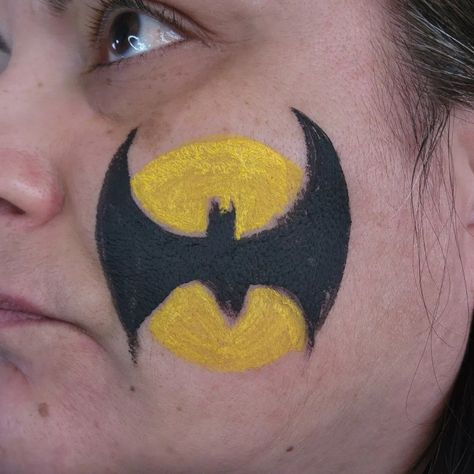 Batman face paint Cheek art Cheek Art Halloween, Bat Face Painting, Face Paint Cheek Art, Canvas Face Painting, Bat Face Paint, Batman Face Paint, Batman Face, Easy Face Painting Designs, Painting Glitter