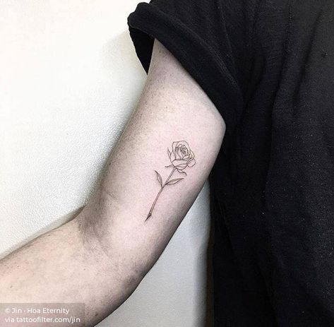 Rose fine line tattoo on the inner arm. Rose Bicep Tattoo Men, Fine Line Rose Tattoo Men, Rose Tattoo Inner Bicep, Rose Inner Arm Tattoo, Bicep Rose Tattoo, Rose Tattoo Bicep, Rose Tattoo Inner Arm, Rose Fine Line Tattoo, Small Fine Line Tattoo