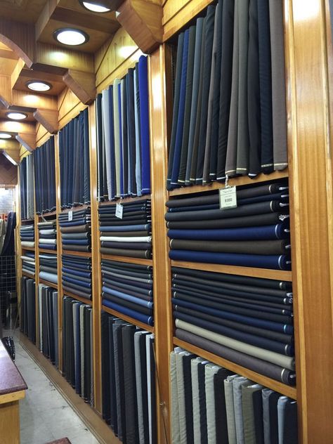 Suiting Shirting Showroom Interior, Cloth Showroom Interior, Tailor Shop Interior, Tailoring Shop Interior Design, Ceo Office Design Luxury Modern, Tailoring Studio, Textile Showroom, Clothing Fabric Patterns, Furniture Store Design