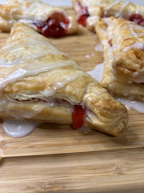 Indulge in the heavenly taste of homemade puff pastry cherry turnovers. Follow our easy recipe for a deliciously fruity and buttery treat. Cherry Turnovers, Homemade Puff Pastry, Turnover Recipes, Cherry Filling, Puff Pastry Dough, Cherry Pie Filling, Pastry Dough, Egg Wash, Pie Filling