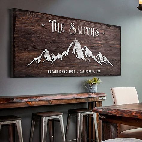 Amazon.com: Tailored Canvases Mountain Wall Art Decor - Personalized Large Rustic Sign for Cabin, Cottage, Camping Site, Entryway, Patio & Custom Gift Idea for Couples, Wedding, Anniversary - Family Mountain Home : Home & Kitchen Adventure Home Decor, Cabin Theme Living Room, Family Signs Wooden, Man Decor, Den Decor, Mountain Wall Decor, Mountain Art Print, Boy Rooms, Mountain Decor