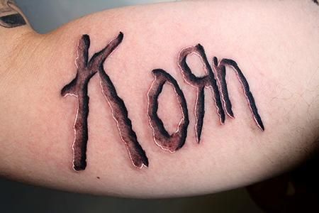 KORN Korn Tattoo, Korn Logo, Abstract Tattoo Ideas, Emo Tattoos, Brother Tattoos, Cool Wrist Tattoos, Scary Tattoos, Metal Tattoo, Red Tattoos