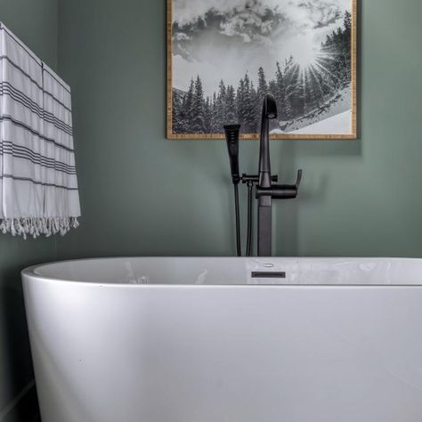 Long Soaking Tub With Green Backsplash in Neutral Contemporary Bathroom | HGTV Hgtv Bathroom Ideas, Hgtv Bathroom, Hgtv Dream Home 2022, Modern Exterior Lighting, Black Tub, Garage Guest House, Green Vanity, White Tub, Hgtv Dream Home