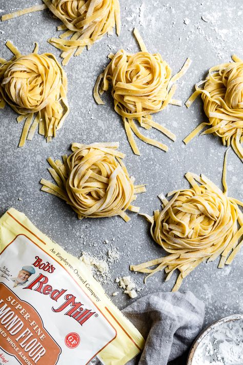 This homemade gluten-free almond flour pasta is a perfect neutral pasta to top with your favorite sauce. Tender eggy noodles with a silken texture and an ever-so-slightly sweet flavor notes. #almondflour #glutenfree #pasta #homemadepasta #recipe #foodblog #Italian #freshpasta #tapiocastarch #sweetriceflour #noodles Homemade Pasta Dough Recipe, Almond Flour Pasta, Homemade Pasta Dough, Pasta Dough Recipes, Keto Pasta, Resep Pasta, Homemade Egg Noodles, Frozen Pasta, Wheat Pasta