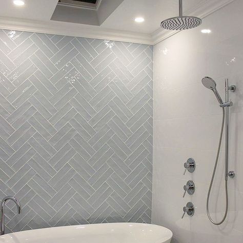 Playing with patterns can infinitely increase the impact of your feature walls. Check out how @anthonymaloneconstructions laid our Crayon… Bathroom Design Scandinavian, Herringbone Feature Wall, Herringbone Tile Bathroom, Double Herringbone, Bathroom Feature Wall, Patterned Bathroom Tiles, Herringbone Wallpaper, Bathroom Design Inspiration, Herringbone Tile