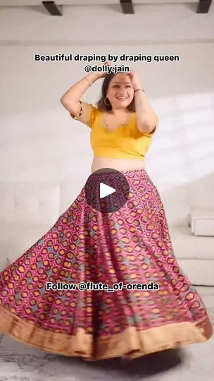 7.3K reactions · 266 shares | Draping is the art of arranging fabric such as lehengas, dupattas, and sarees, in a stylish and aesthetically pleasing manner. It’s a traditional skill that is particularly prominent in Indian fashion. Skilled draping can enhance the beauty of the fabric and create stunning visual effects.

We all love draping of our DRAPING QUEEN DOLLY JAIN . Much gratitude dolly ji  for making it easier.

Video credit @dolly.jain 

Follow for more @flute_of_orenda 

Skirts, lehengas and kaftans available on website 
fluteoforenda.com

#draping #lehengalove #drapingbeauty #explore
#explorepage #flowydresses  #fashion #instagood #womenfashion #girlsfashion
#fluteoforenda #reelsinsta  #traditionalstyle
#viral #skirts #kaftans #timelessstyle | TIMELESS Apparels | Skirts | Kaftan Skirt And Saree Drape, Ghagra Draping Styles, Can Can Saree Drape, Lehenga Dupatta Draping Style, Dupatta Draping Styles, Dolly Jain, Chania Choli, Dupatta Draping, Saree Drapes