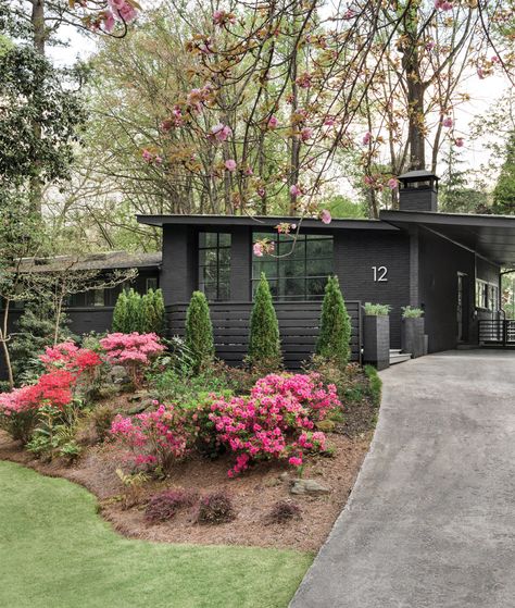 Dark Mid Century Modern Exterior, Unique Exterior House Colors Paint, Mid Century Exterior Lighting, Black Paint Colors, White Painted Floors, Mid Century Modern House Exterior, Brian Patrick Flynn, Guest Bathroom Design, 80s House