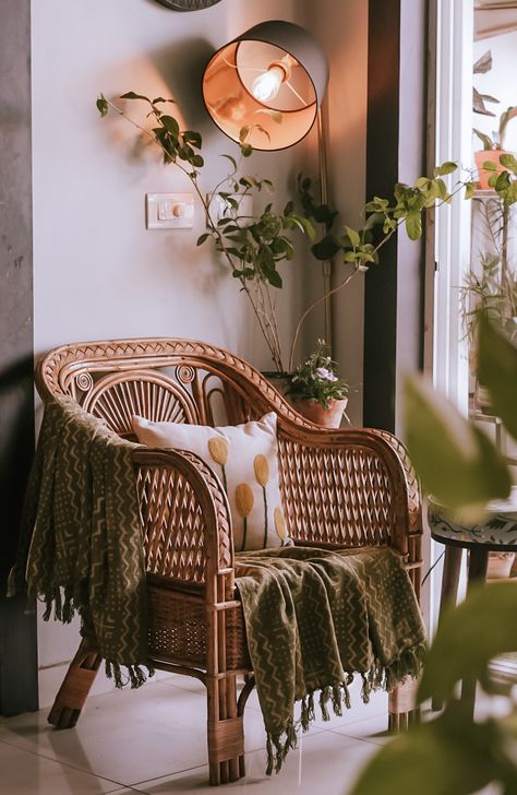 The bamboo chair and indoor plants bring an earthy energy to the living room design. The neutral walls in the background help create a calming and harmonious atmosphere, allowing the natural elements to take centre stage. The accent chair and living room decor add to the aesthetic appeal of the space, making it a beautiful corner of your home Cr: Agirlandhernest (IG) Money Plants, Brown Lamp, White Lounge Chair, Living Room Interiors, Green Money, Garden Lounge Chairs, Lounge Chair Bedroom, Fabric Lounge Chair, White Stool