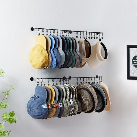 PRICES MAY VARY. Large Capability Hat Rack: This set of 4 hat hangers organizer for wall comes with 40 pack metal ring with clips, which can hold up to 40 caps. This cap organizer is a perfect storage tool for caps storage, free up your closet space. Durable Cap Display Rack: The heavy duty black hat organizers is made of high quality metal with rust-resistant coating. Stainless steel clip is strong enough to hold the cap (unlike the S hooks, which is very easy to fall off the rod), but does not Hat Organizer Wall, Caps Storage Ideas, Cap Storage Hat Organization, Display Hats Ideas, Hat Storage Wall, Wall Mounted Rack, Hat Organizer Ideas, Closet Wall Organization, Cap Hanger Ideas