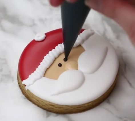 How to decorate sugar cookies with icing Santa Decorated Sugar Cookies, Santa Sugar Cookies Decorated, Snowman Cookies Decorated, Santa Cookies Decorated, Decorated Christmas Sugar Cookies, Little Cookie Co, Rudolph Cookies, Cookie Kits, Penguin Cookies