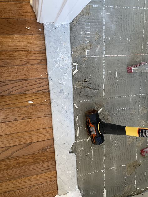 Installing a Marble Threshold - All About The House Marble Door Threshold, Door Threshold Ideas Interior, Marble Transition Strip, Bathroom Threshold Ideas, Marble Threshold Transition, Bathroom Threshold Transition, Marble Shower Threshold, Door Threshold Ideas, Bathroom Threshold