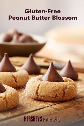 Enjoy Gluten-Free Peanut Butter Blossoms while on the go or simply on your couch. This fun classic is made with HERSHEY’S KISSES Brand Milk Chocolates, REESE’S Peanut Butter, and of course, gluten-free flour for a delicious addition to your next bake sale or cookie exchange. Peanut Butter Blossoms Recipe, Peanut Butter Blossom, Peanut Butter Kiss, Cookies Peanut Butter, Gluten Free Milk, Gluten Free Christmas Cookies, Peanut Butter Blossom Cookies, Blossom Cookies, Gluten Free Peanut Butter