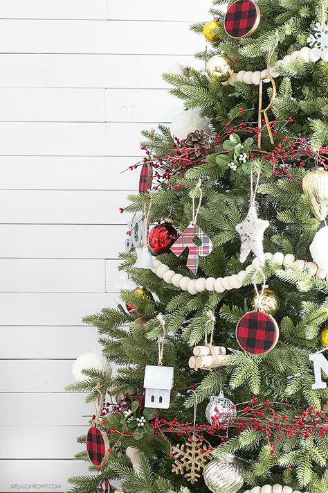 A simple rustic Christmas tree using wool felt balls for garland and splashes of plaid. Love the mix of the old and the new too. livelaughrowe.com Wood Ball Garland Christmas Tree, Yarn Stars, Rustic Glam Christmas Tree, Christmas Tree Topper Rustic, Plaid Christmas Rugs, Tartan Plaid Christmas Ornaments, Rustic Farmhouse Christmas Tree Wooden Ornaments, Burberry Plaid.christmas Tree, Changing My Life