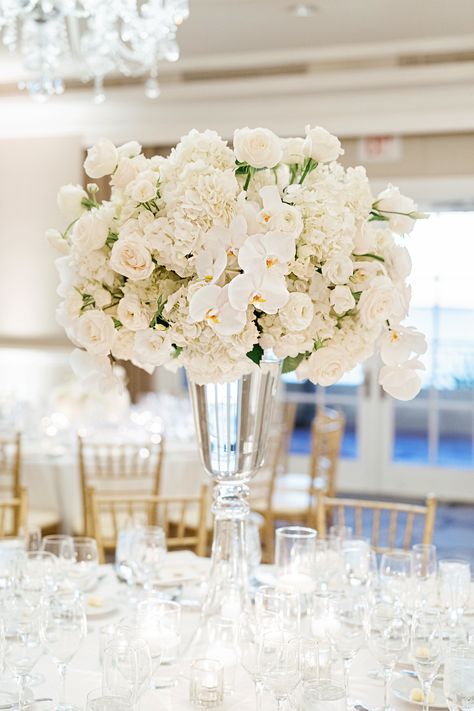 Elegant All-White Wedding at Ritz-Carlton, Laguna Niguel - Flowers by Cina All White Flower Centerpieces, Wedding White Roses, Elevated Centerpiece, Wedding Flowers Orange, Wedding Table Centerpieces Elegant, White Wedding Flowers Centerpieces, White Flower Centerpieces, Fairytale Wedding Decorations, Rose Centerpieces Wedding