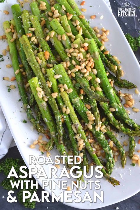 This side dish is great any time, but is best when fresh asparagus is in season. Roasted Asparagus with Pine Nuts and Parmesan has perfectly cooked asparagus with the saltiness of freshly grated parmesan and the nuttiness of delicately toasted pine nuts. Super fast, super yummy, and super easy! #asparagus #pinenuts #parmesan #roasted #sidedish Asparagus Rositto, Pan Seared Asparagus With Cashews, Pinenut Recipes Dinners, Asparagus Recipes Thanksgiving, Christmas Asparagus Side, Christmas Asparagus Recipes, Thanksgiving Asparagus Recipes, Christmas Asparagus, Pine Nuts Recipes