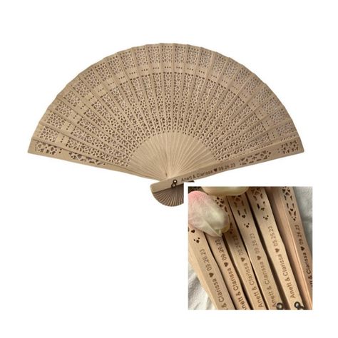 PRICES MAY VARY. Materials - The Fans are made of natural sandalwood and has a pleasant aroma of the wood itself; Natural wood color generally has a difference. Size - 8" x 1" x 1" inches (Folding) - ( 20 x 2.5 x 2.5 cm), 13" x 8" inches (unfolded) - ( 33 x 20 cm) Light weight, foldable, easy to carry and collect. The wooden foldable hand-held fan is ideal for staying cool in warm weather. Practical and decorative, perfect for weddings, graduation gifts, houses, party favor bridal shower and fes Bridal Shower Christmas, Fan Favors, Wooden Fan, Hand Fans For Wedding, Folding Fans, Folding Hand Fan, Wedding Fans, Ceremony Decor, Hand Held Fan