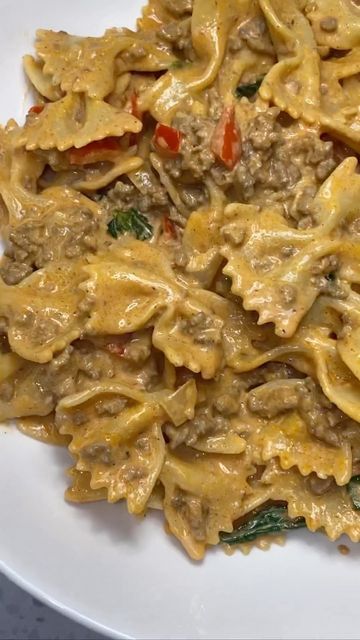 Kelsi ✨🍴✨ on Instagram: "Let’s make 🍝⬇️ Ingredients: 1lb ground beef 1 box bow tie pasta 1 small onion 1/2 red bell pepper, diced Adobo all purpose seasoning Garlic powder Paprika 1 tbsp tomato paste 1 3/4 cup heavy cream 1cup spinach A little less than 1/4 cup white wine 1. Boil your pasta to Al dente. Add a pinch of salt and mix 2. Cook your ground beef and seasoning with Cajun seasoning, adobo all purpose, paprika, and garlic powder. Remove from the pan 3. In the same pan, sauté Bow Tie Beef Pasta, Cajun Beef Pasta, Bow Tie Pasta With Ground Beef, Ground Beef And Bow Tie Pasta, Ground Beef Bowtie Pasta Recipes, Bowtie Pasta Recipes Beef, Bow Tie Pasta Recipes Ground Beef, Pasta With Diced Tomatoes, Bow Tie Pasta Recipes