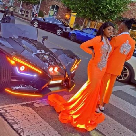 Orange And Silver Prom Suit, Orange Prom Black Couple, Orange And Tan Prom, Orange Prom Suit, Orange Prom Couple, Prom Couples Black People, Silver Prom Suits, Prom Black Couples, Guys Prom Outfit