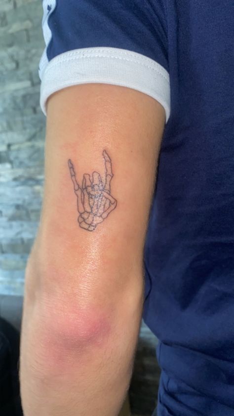 Rock Hand Symbol Tattoo, Skeleton Hand Rock On Tattoo, Rock Symbol Tattoo, Skeleton Rock Hand Tattoo, Rock N Roll Tattoo Ideas, Tattoos Rock N Roll, Rock Hand Tattoo, Tattoo Rock N Roll, Rock N Roll Tattoo