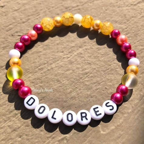 Selena’s Jewelz on Instagram: “Encanto Themed Bracelet 👂 Message me for more info! #DisneyBracelet #Disney #DisneyLand #Disneymom #Encanto #EncantoBracelet #Mirabel…” Encanto Crafts, Bracelet Message, Disney Bracelet, Disney Mom, Letter Bracelet, Bracelet Ideas, Message Me, Ring Necklace, Disneyland