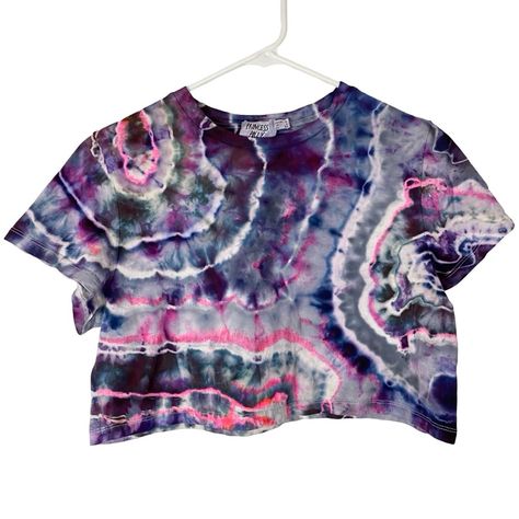 One Of A Kind, Handmade I’m Not Interested In Low Offers Princess Polly Geode Tie Dye Tee Tshirt Crop Womens Size 4 / Small Also Fits Size Xs See Measurements Crewneck / Round Neck Short Sleeves 100% Cotton Jersey Knit Fabric Cropped Length, Boxy Fit Custom Ice Tie Dye, Geode Rock Design One Of A Kind, Handmade, Not Interested In Low Offers! Purple, White, Grey, Neon Pink Etc Photos Do Not Do It Justice! This Shirt Is Awesome Good Used Condition Light Wash & Wear Texture Note: This Is Listed As Boutique Because It Has Been Remade & Comes With Tags By Honey Recycled Fashions Check Out My Closet: 1500+ Listings & More Tie Dye Bundle & Make An Offer! See Photos For Product Details Feel Black Puff Sleeve Top, Tshirt Crop, Random Clothes, Cutout Crop Top, Layered Tank Top, Puff Sleeve Crop Top, Tie Crop Top, Grey Tie Dye, Recycled Fashion